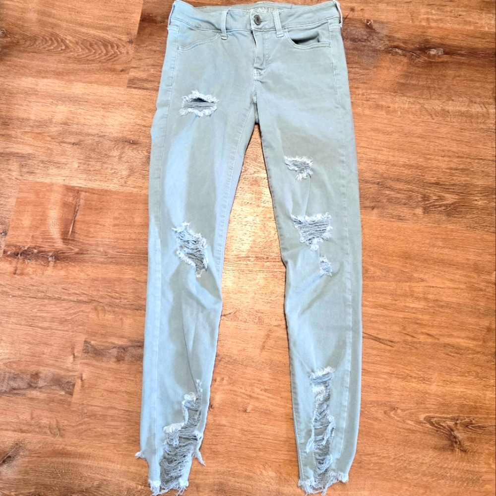 American Eagle Outfitters Greenish Gray Skinny Jeans with Distressed Hem Size 4
